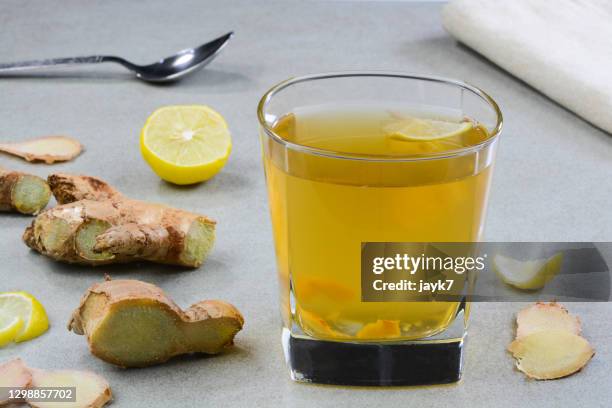 ginger lemon drink - ginger glasses stock-fotos und bilder