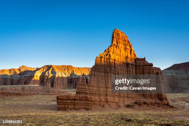 temple of the moon at sunset, cathedral valley, capitol reef national park, utah, western united states, usa - parque nacional de capitol reef - fotografias e filmes do acervo