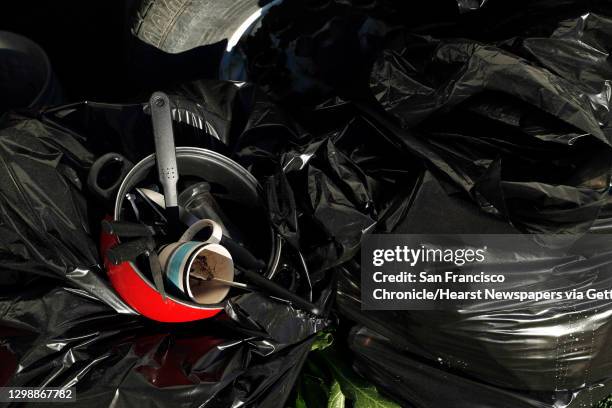 Discarded kitchen items and trash bags at Oasis Village, a proposed and since-abandoned emergency housing center for North Bay fire victims in Santa...