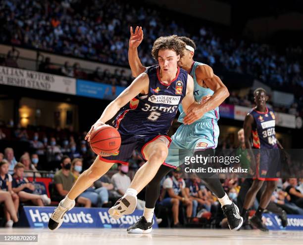 Josh Giddey of the 36ers drives to the basket during the round three NBL match between the Adelaide 36ers and the New Zealand Breakers at Adelaide...