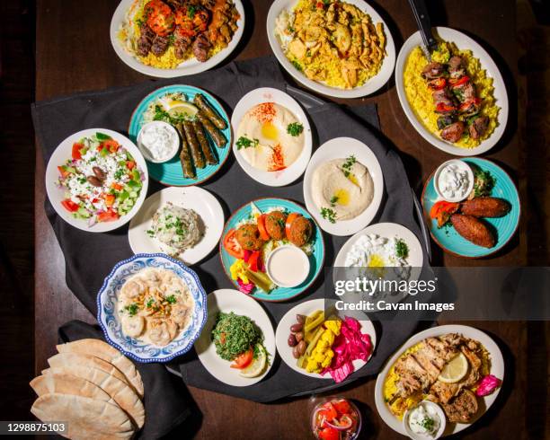 above-view of a mediterranean feast displayed on a table - middle eastern food stock pictures, royalty-free photos & images