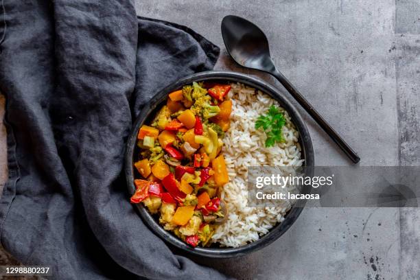 vegetarian pumpkin curry - rice grain stock-fotos und bilder