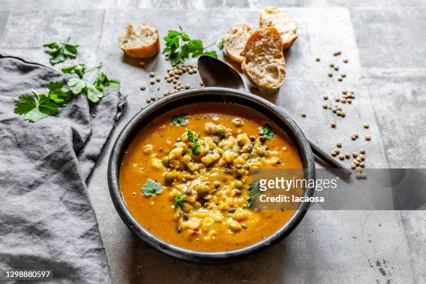bowl of lentil soup - soup stock pictures, royalty-free photos & images