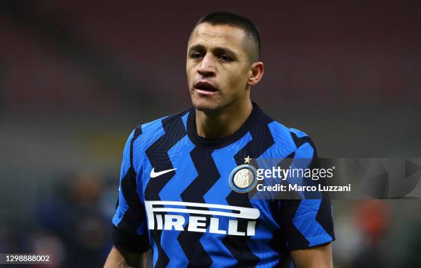 Alexis Sanchez of FC Internazionale looks on during the Coppa Italia match between FC Internazionale and AC Milan at Stadio Giuseppe Meazza on...