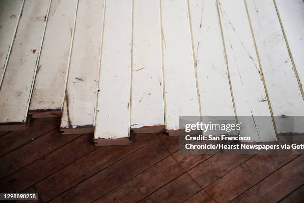 Worn floorboards taken from an abandoned anti-drug cult commune act as a piece in artist Phillip Lewis' upcoming installation titled ""Synanon""...