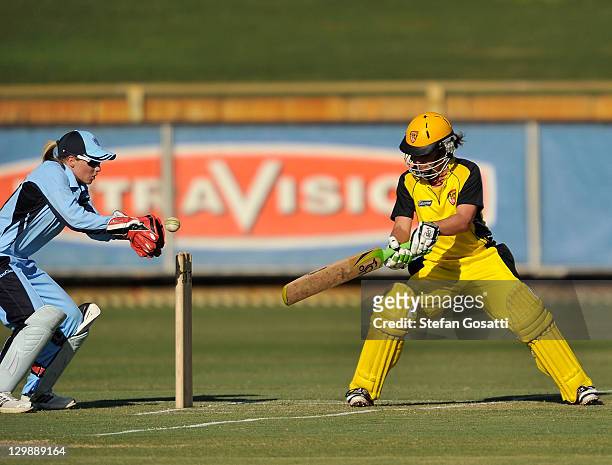 Avril Fahey of the Fury plays and misses during the Women's Twenty20 match between the West Australia Fury and the New South Wales Breakers at WACA...