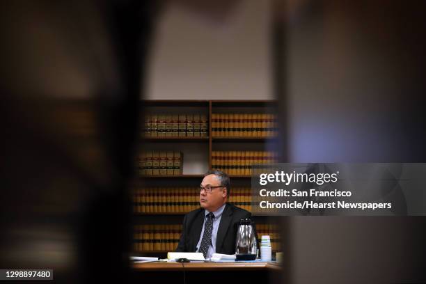 Attorney for King County David Hackett listens to rebuttal arguments during a hearing where a coalition of counties, transportation agencies and the...