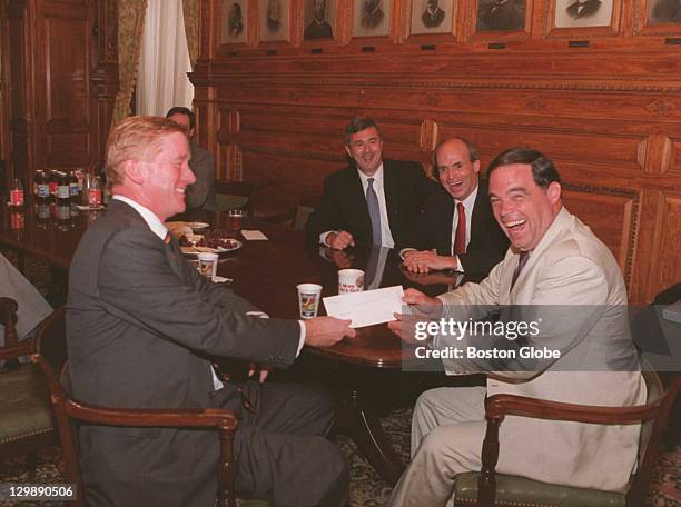 William Weld at the moment of his resignation with Lt. Governor Paul Cellucci, House Speaker Thomas Finneran and Senate President Thomas Birmingham.