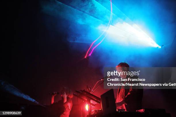 Montreal duo Young Galaxy performs during a laser light show at the Pacific Science Center, April 5, 2018.