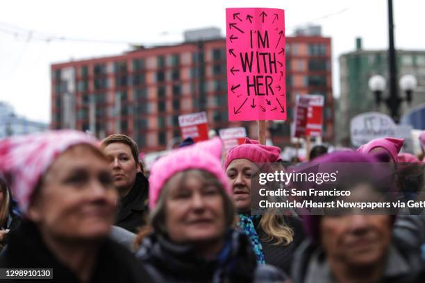 Thousands march through the streets of Seattle, from Cal Anderson Park to the Seattle Center, for the Women's March 2.0, Saturday, Jan. 20, 2018....