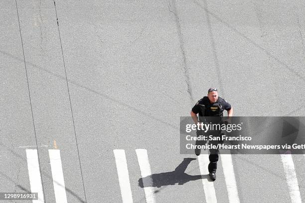 Officers respond after two Seattle Police Department officers were shot while responding to a robbery in downtown Seattle on Thursday, April 20, 2017.