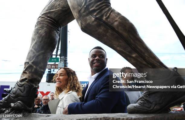 Former Mariner Ken Griffey Jr. Stands with his wife Melissa and son Trey during the unveiling of a new statue in Griffey's likeness outside Safeco...