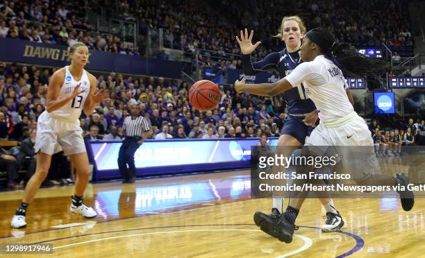 S Aarion McDonald, right, passes to Katie Collier around Montana's Delany Junkermier during a first round NCAA Tournament game between University of...