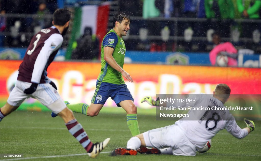 Colorado goal keeper Zac MacMath snatches the ball away from... News ...