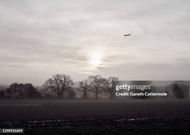 An aeroplane departs from Stansted Airport on January 27, 2021 in Stansted, United Kingdom.