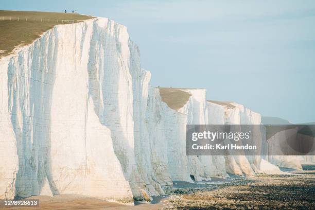 a daytime view of the seven sisters cliffs on the east sussex coast - stock photo - carbonato di calcio foto e immagini stock