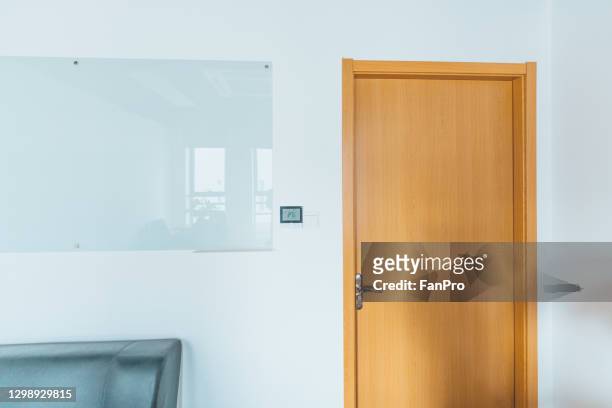 the wooden door of the office - close door stock pictures, royalty-free photos & images