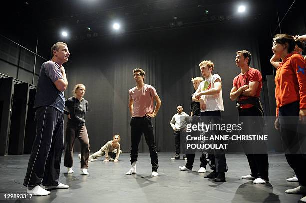 French dancer and chorographer Michel Kelemenis speaks with dancers of the Geneva's Great Theatre on October 21, 2011 at the Maison pour la danse...