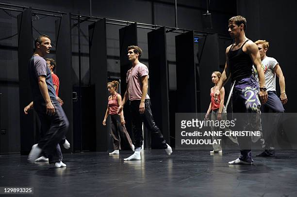 French dancer and chorographer Michel Kelemenis trains with dancers of the Geneva's Great Theatre on October 21, 2011 at the Maison pour la danse...