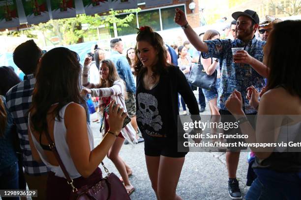 People dance at the annual Cinco de Mayo block party hosted by the Green Lake Tacos Guaymas, March 5, 2016. The party featured food, drinks, various...