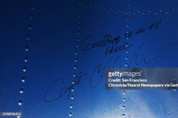 Goodbye to an old friend reads a message signed by a pilot inside of the wheel well of the 1933 Boeing 247D Airliner at the Museum of Flight after...