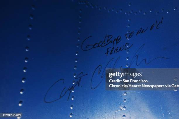 Goodbye to an old friend reads a message signed by a pilot inside of the wheel well of the 1933 Boeing 247D Airliner at the Museum of Flight after...