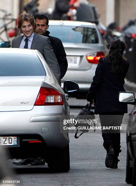 Jean Sarkozy , one of French President's son , arrives by car with his wife, Jessica Sebaoun-Darty, at La Muette clinic on October 21, 2011. France's...