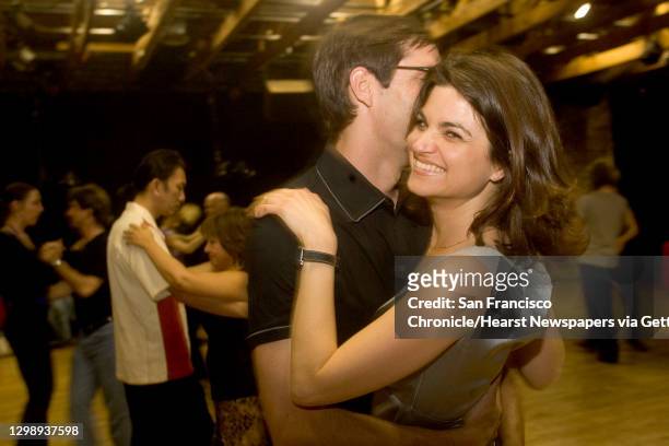 17th St. San Francisco, CA;Lauren MacLaughlin, is all smiles while she dances with friend Matt Brinker.;Dancing in the Bay area. Tango lessons at the...