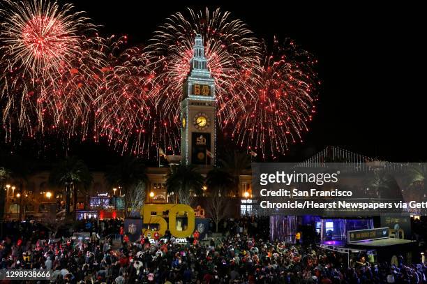 Fireworks go off behind the Ferry Building on the opening night of events for the Super Bowl City Jan. 30, 2016 in San Francisco, Calif.