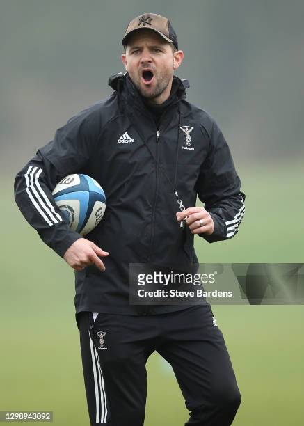 Harlequins Attacks and Backs coach, Nick Evans gives instuctions during a Harlequins training session at Surrey Sports Park on January 27, 2021 in...