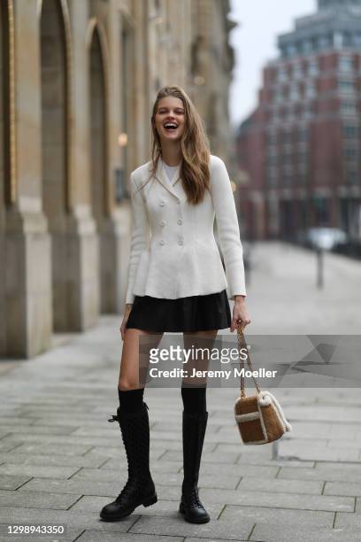 Kim Riekenberg wearing complete Dior look and bag on January 25, 2021 in Hamburg, Germany.