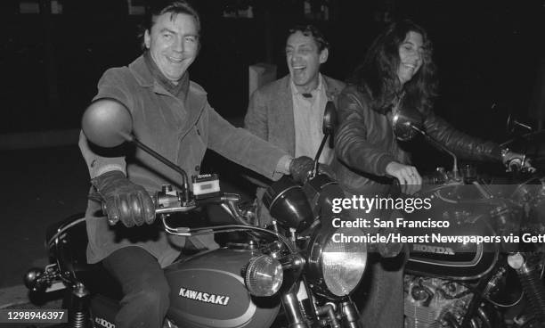 Sheriff Hongisto, Harvey Milk, and campaign aid Joyce Garay head off on motorcycles from City Hall to campaign headquarters on 575 Castro for a...