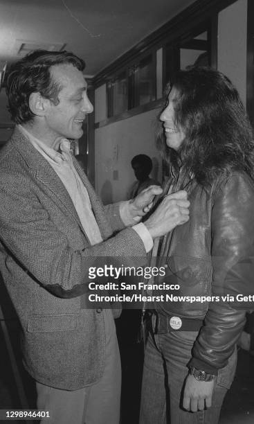 Harvey Milk hugs campaign aid Joyce Garay after winning his 1977 campaign for San Francisco District Supervisor, 11th September 1977.