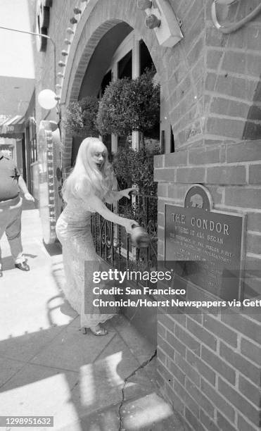 Carol Doda and Davey Rosenberg celebrate the reopening of the Condor Club, June 18, 1976