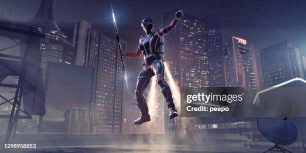 weiblicher jet pack superheld mit staff lands on city rooftop - jet pack stock-fotos und bilder