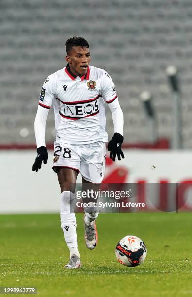 Hicham Boudaoui of OGC Nice runs with the ball during the Ligue 1 match between RC Lens and OGC Nice at Stade Bollaert-Delelis on January 23, 2021 in...