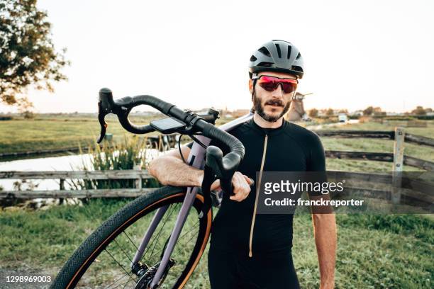 cyclist in netherland at dusk - 2020 eyeglasses stock pictures, royalty-free photos & images