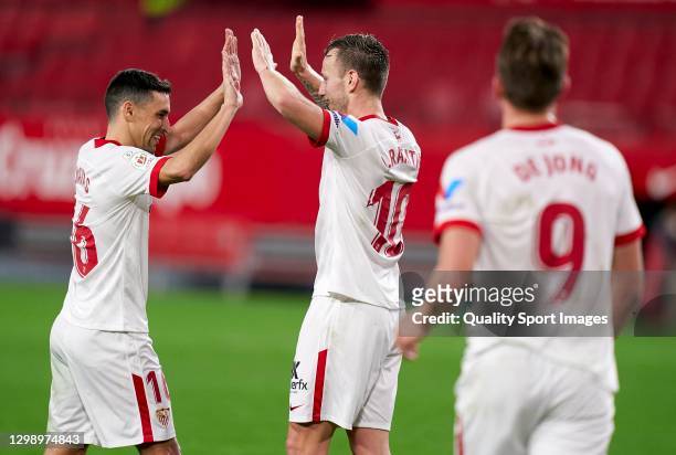 Ivan Rakitic of Sevilla FC celebrates after scoring his team's third goal with his teammate Jesus Navas during the Copa del Rey 4th Round match...
