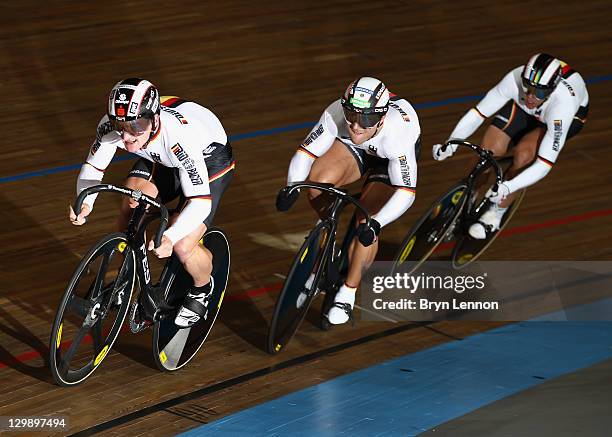 Rene Enders, Robert Forstemann and Stefan Nimke of Germany ride in the final of the Men's Team Sprint at the 2011 Track Cycling European...