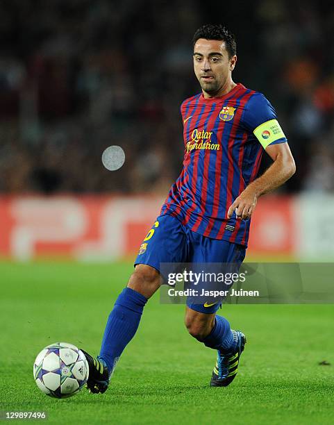 Xavi Hernandez of FC Barcelona runs with the ball during the UEFA Champions League group H match between FC Barcelona and FC Viktoria Plzen at the...
