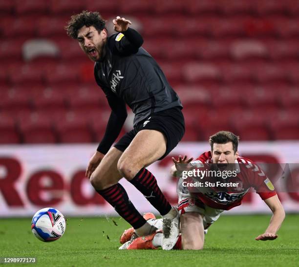 Matt Crooks of Rotherham United is tackled by Paddy McNair of Middlesbrough during the Sky Bet Championship match between Middlesbrough and Rotherham...