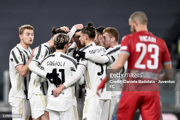 Alvaro Morata of Juventus celebrates with teammates after scoring his team's first goal during the Coppa Italia match between Juventus and SPAL at...
