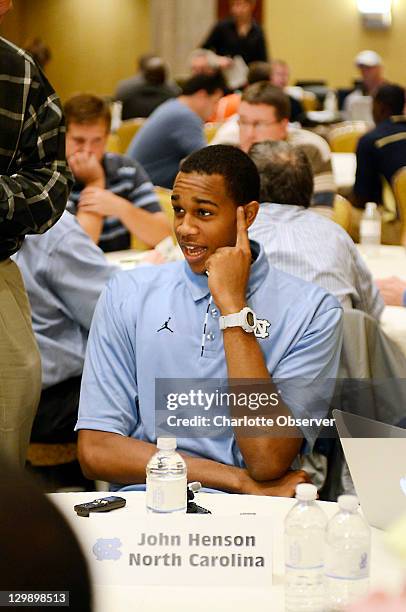 North Carolina player John Henson talks with the media during am ACC Operation Basketball event at the Ritz-Carlton in Charlotte, North Carolina,...