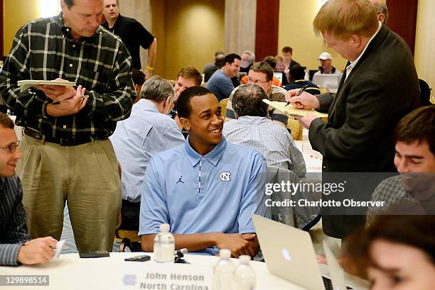 North Carolina player John Henson talks with the media during am ACC Operation Basketball event at the Ritz-Carlton in Charlotte, North Carolina,...