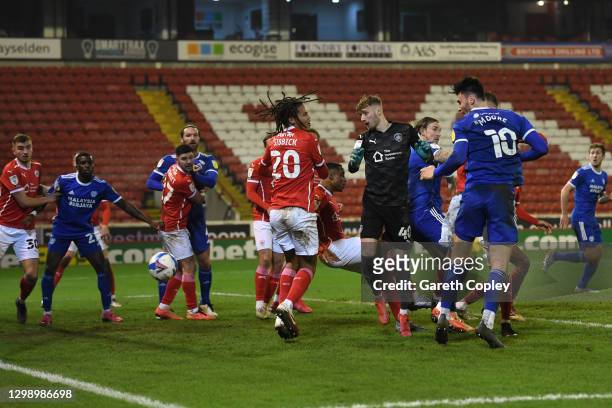 Kieffer Moore of Cardiff City scores their side's second goal during the Sky Bet Championship match between Barnsley and Cardiff City at Oakwell...