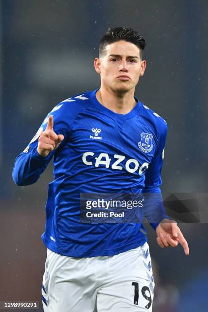 James Rodriguez of Everton celebrates after scoring their side's first goal during the Premier League match between Everton and Leicester City at...