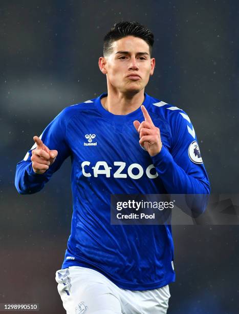 James Rodriguez of Everton celebrates after scoring their side's first goal during the Premier League match between Everton and Leicester City at...