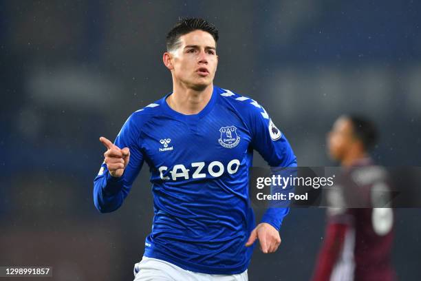 James Rodriguez of Everton celebrates after scoring their side's first goal during the Premier League match between Everton and Leicester City at...