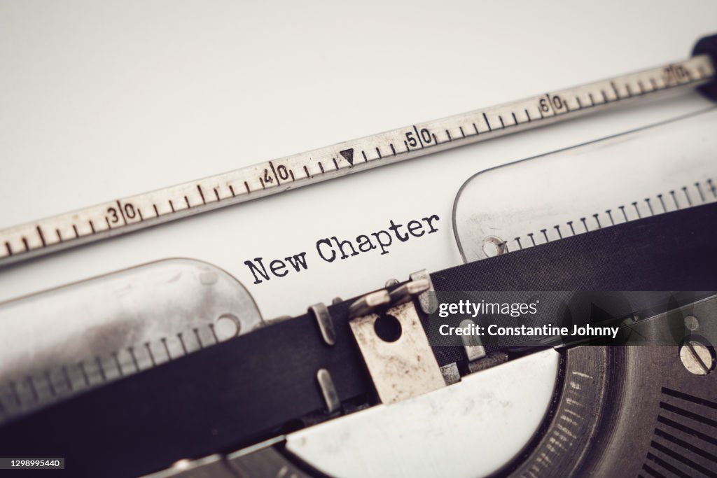 New Chapter. Close Up of Typewriter Close Up View with Text.