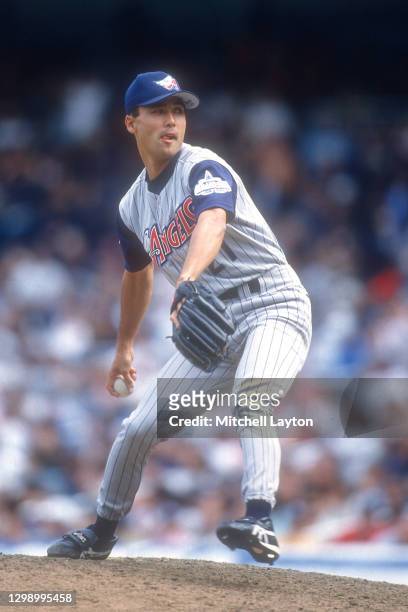 Shigetoshi Hasegawa of the Anaheim Angels pitches during a baseball game against the New York Yankees on July 23, 1997 at Yankee Stadium in New York...